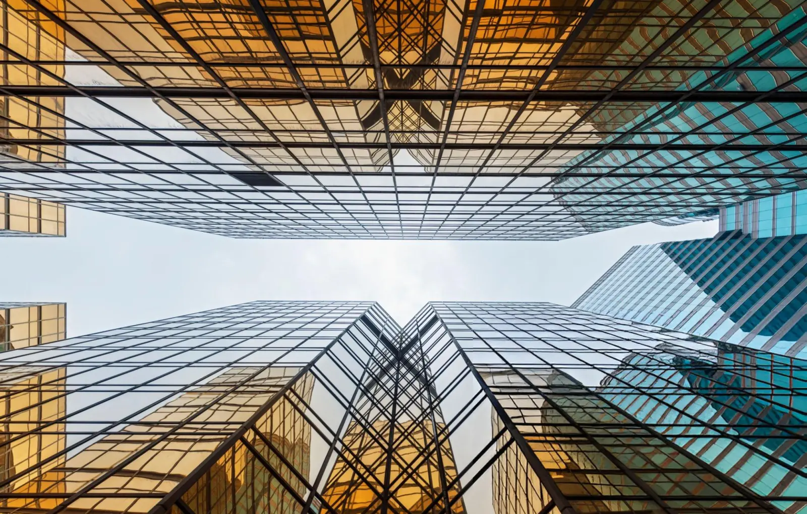 Glass office towers seen from below